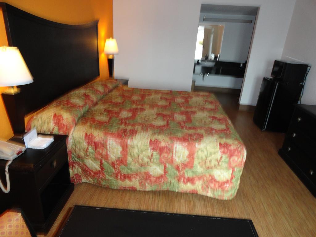 Econo Lodge Metropolis Værelse billede